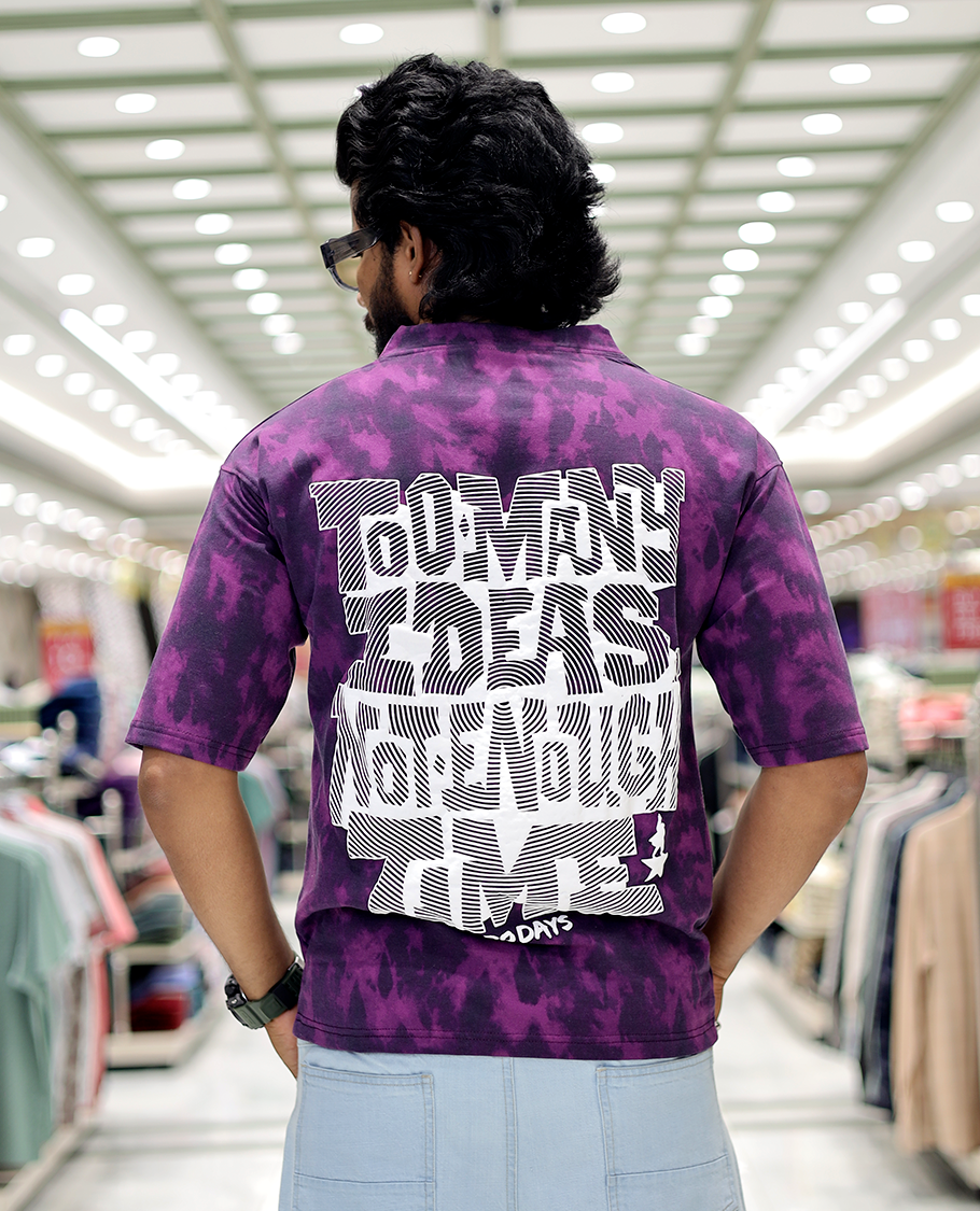 Purple Oversized Cotton-Blended T-Shirt Features an Abstract Dyed Typography Print, Half-Sleeves, Crew Neck, and Regular Length