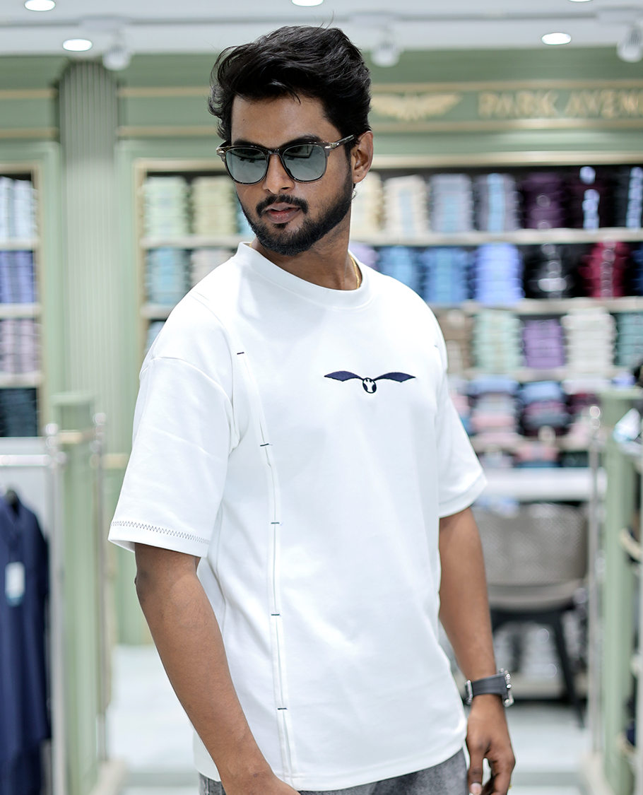 White Solid Cotton-Blended T-Shirt Features Half Sleeves, a Crew Neck, a Regular Fit, and a Regular Length