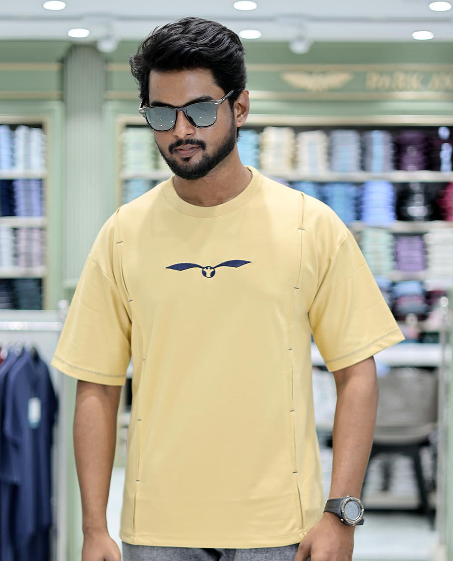 Yellow Solid Cotton-Blended T-Shirt Features Half Sleeves, a Crew Neck, a Regular Fit, and a Regular Length