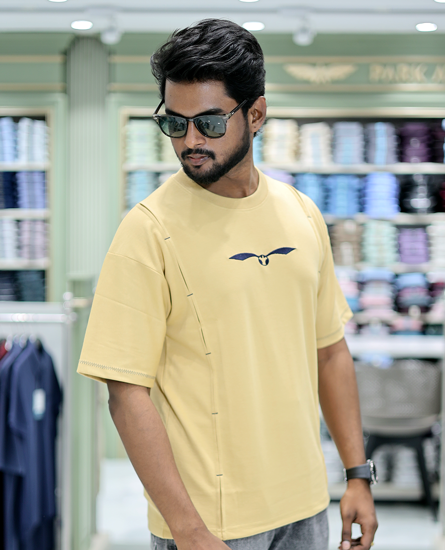 Yellow Solid Cotton-Blended T-Shirt Features Half Sleeves, a Crew Neck, a Regular Fit, and a Regular Length