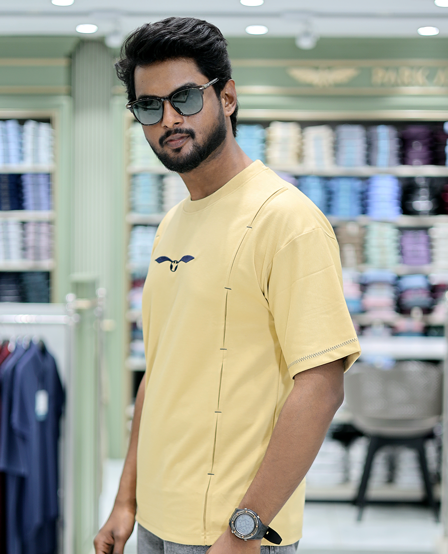 Yellow Solid Cotton-Blended T-Shirt Features Half Sleeves, a Crew Neck, a Regular Fit, and a Regular Length