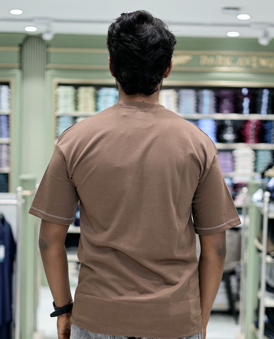 Brown Solid Cotton-Blended T-Shirt Features Half Sleeves, a Crew Neck, a Regular Fit, and a Regular Length