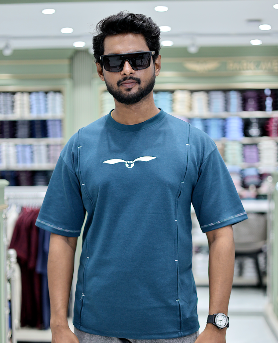 Teal Solid Cotton-Blended T-Shirt Features Half Sleeves, a Crew Neck, a Regular Fit, and a Regular Length