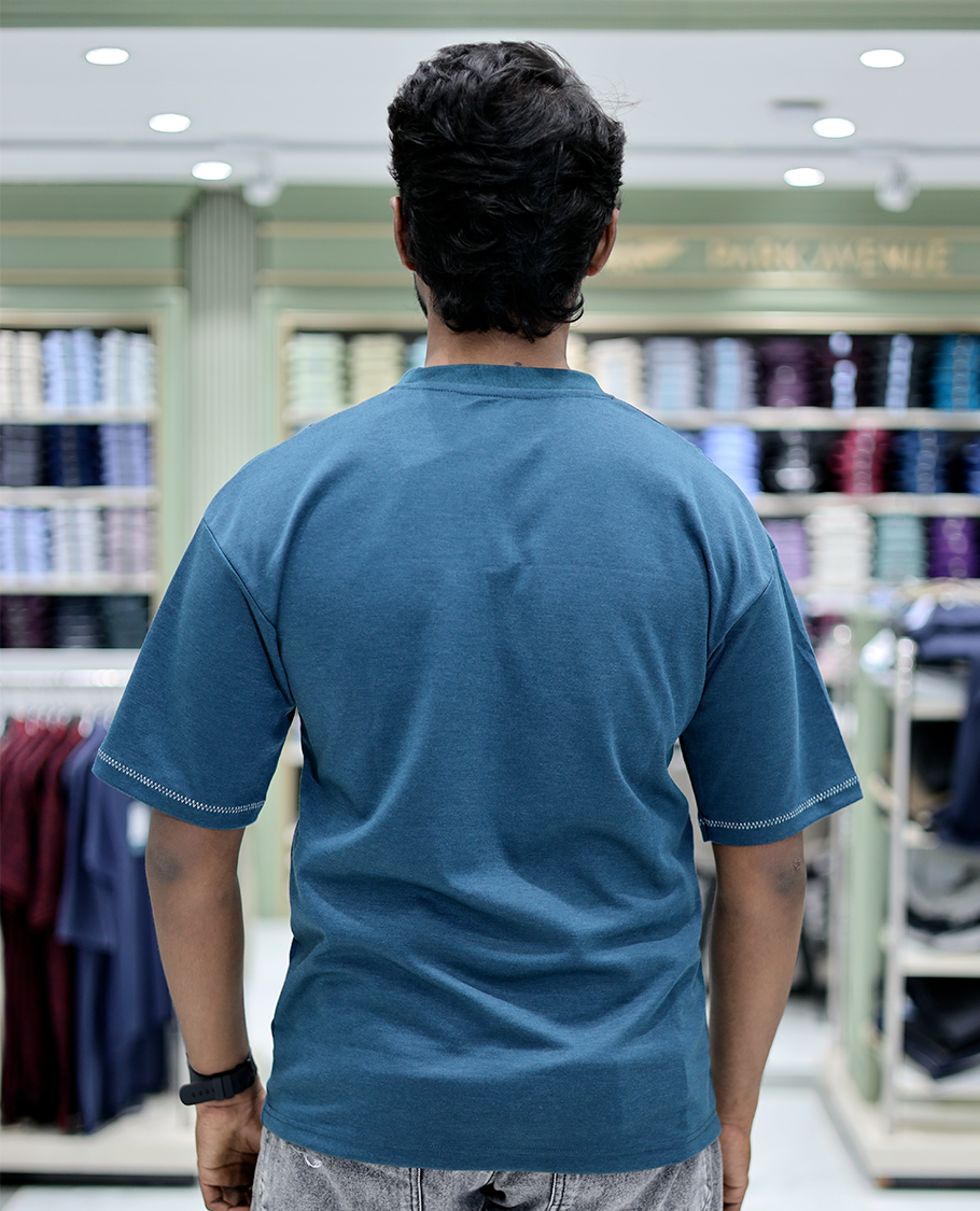 Teal Solid Cotton-Blended T-Shirt Features Half Sleeves, a Crew Neck, a Regular Fit, and a Regular Length