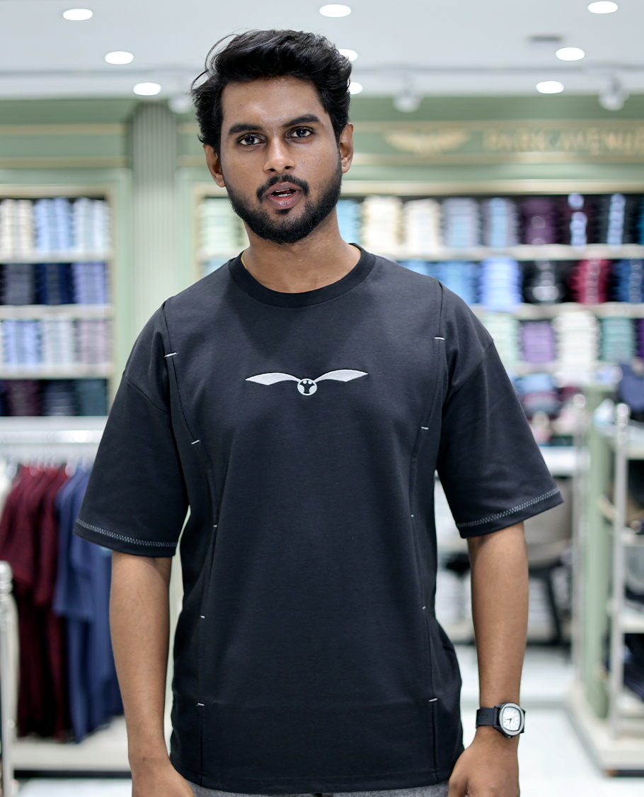 Black Solid Cotton-Blended T-Shirt Features Half Sleeves, a Crew Neck, a Regular Fit, and a Regular Length