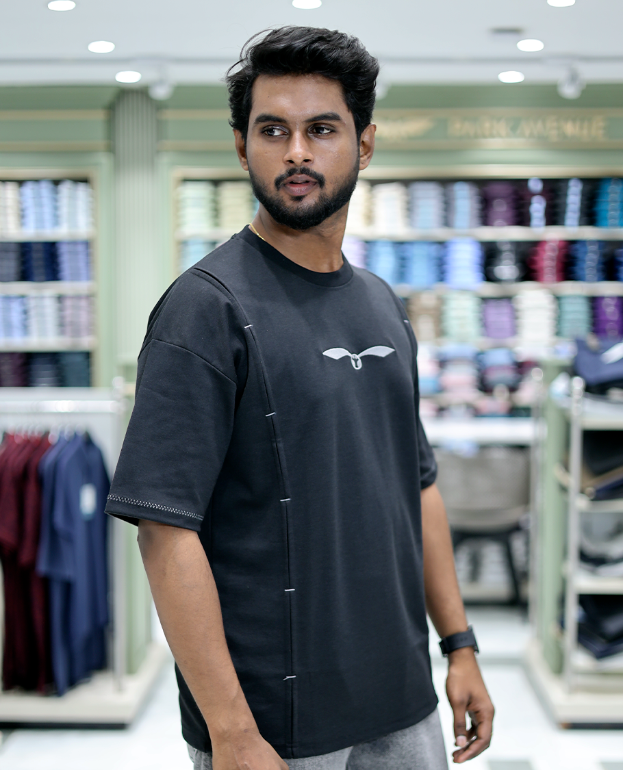 Black Solid Cotton-Blended T-Shirt Features Half Sleeves, a Crew Neck, a Regular Fit, and a Regular Length