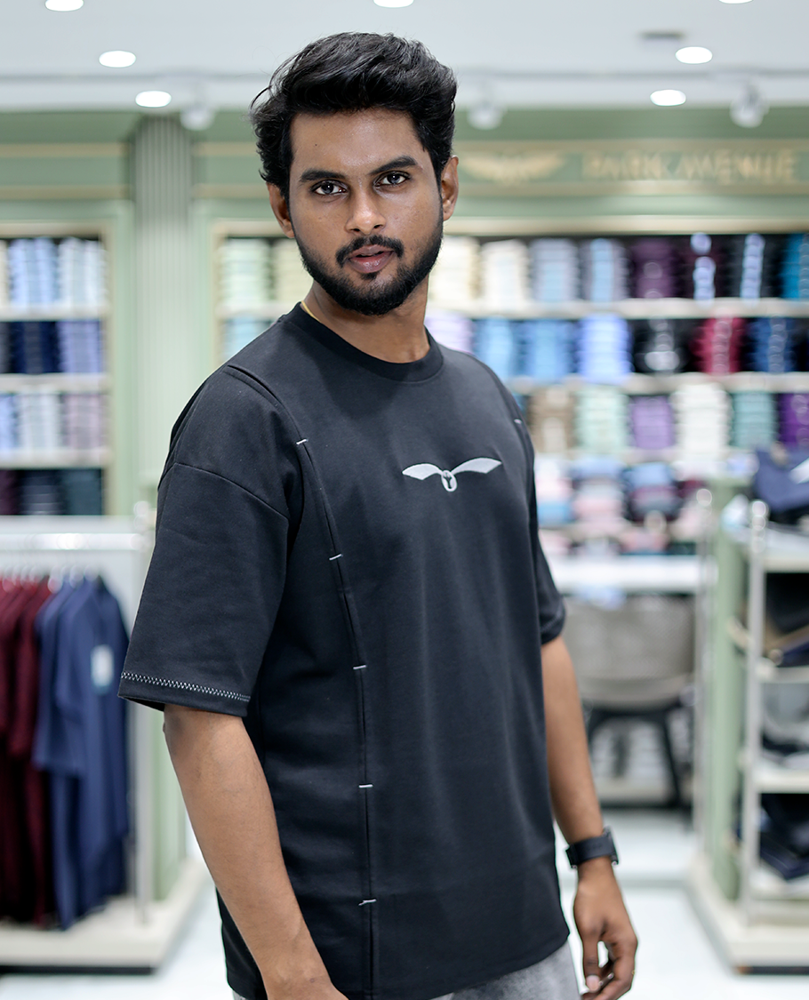 Black Solid Cotton-Blended T-Shirt Features Half Sleeves, a Crew Neck, a Regular Fit, and a Regular Length