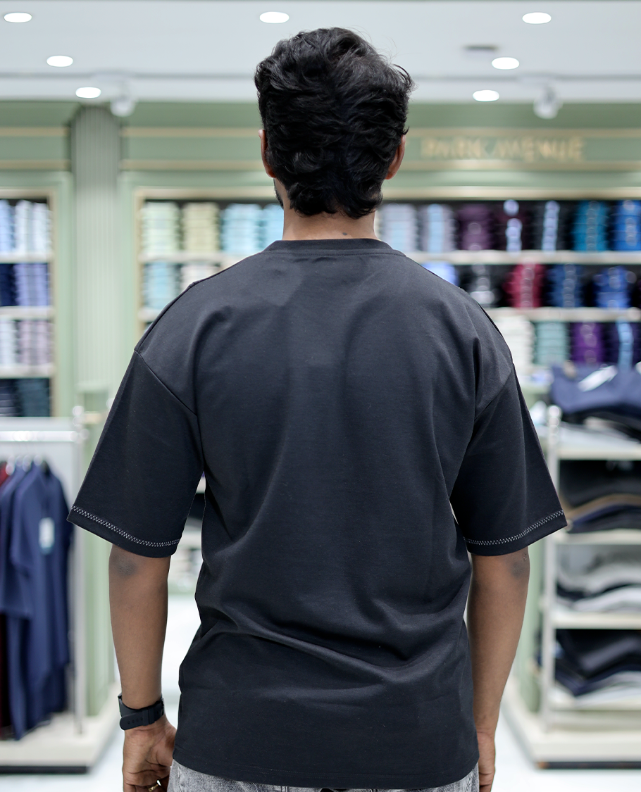 Black Solid Cotton-Blended T-Shirt Features Half Sleeves, a Crew Neck, a Regular Fit, and a Regular Length