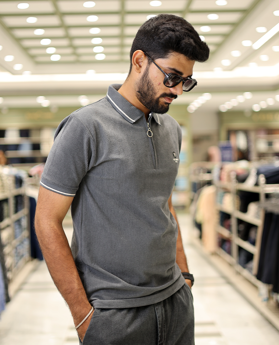 Dark Grey Corduroy T-Shirt Comes with a Polo Neck, Half-Sleeves, a Slim Fit, and Regular Length