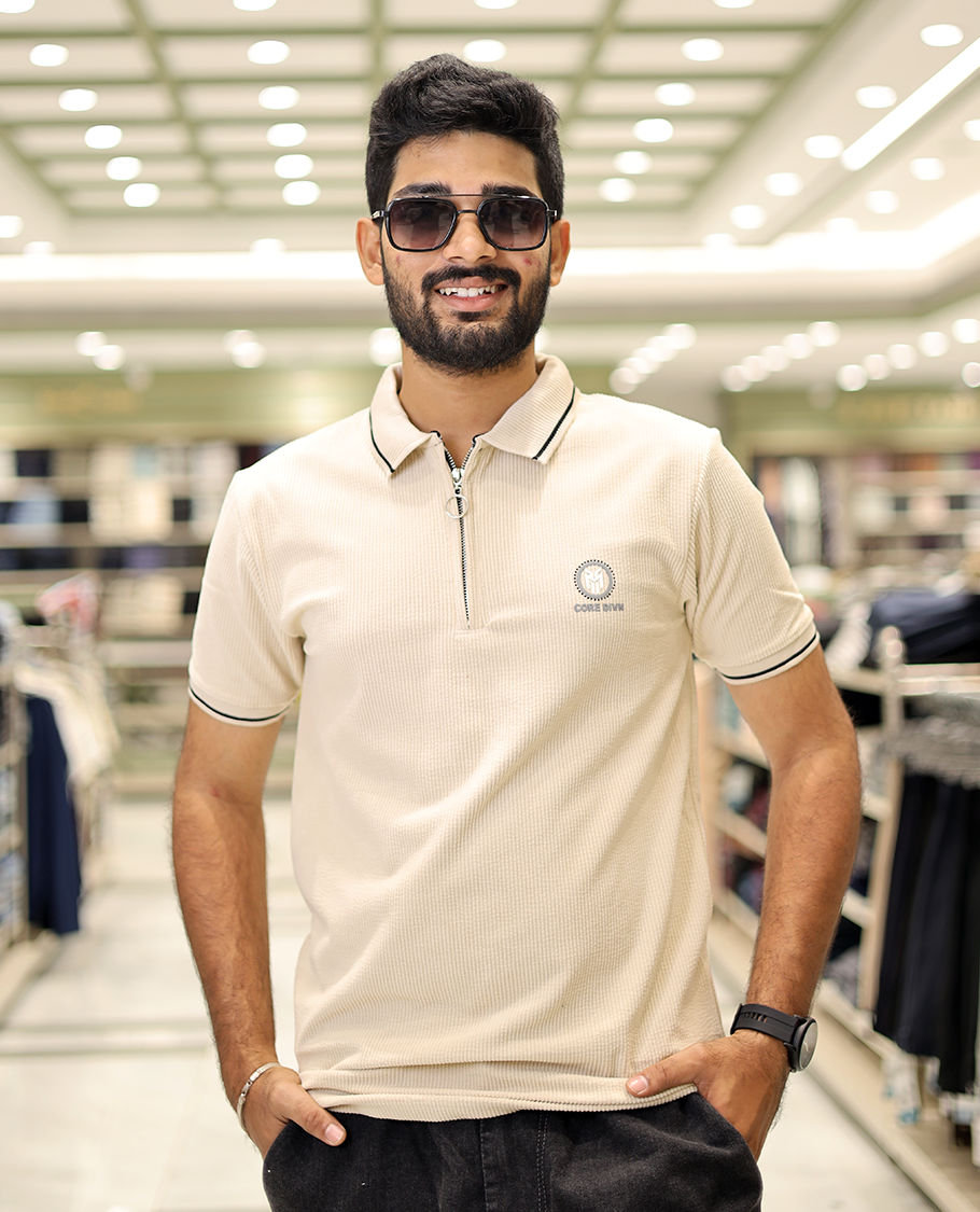 Cream Corduroy T-Shirt Comes with a Polo Neck, Half-Sleeves, a Slim Fit, and Regular Length