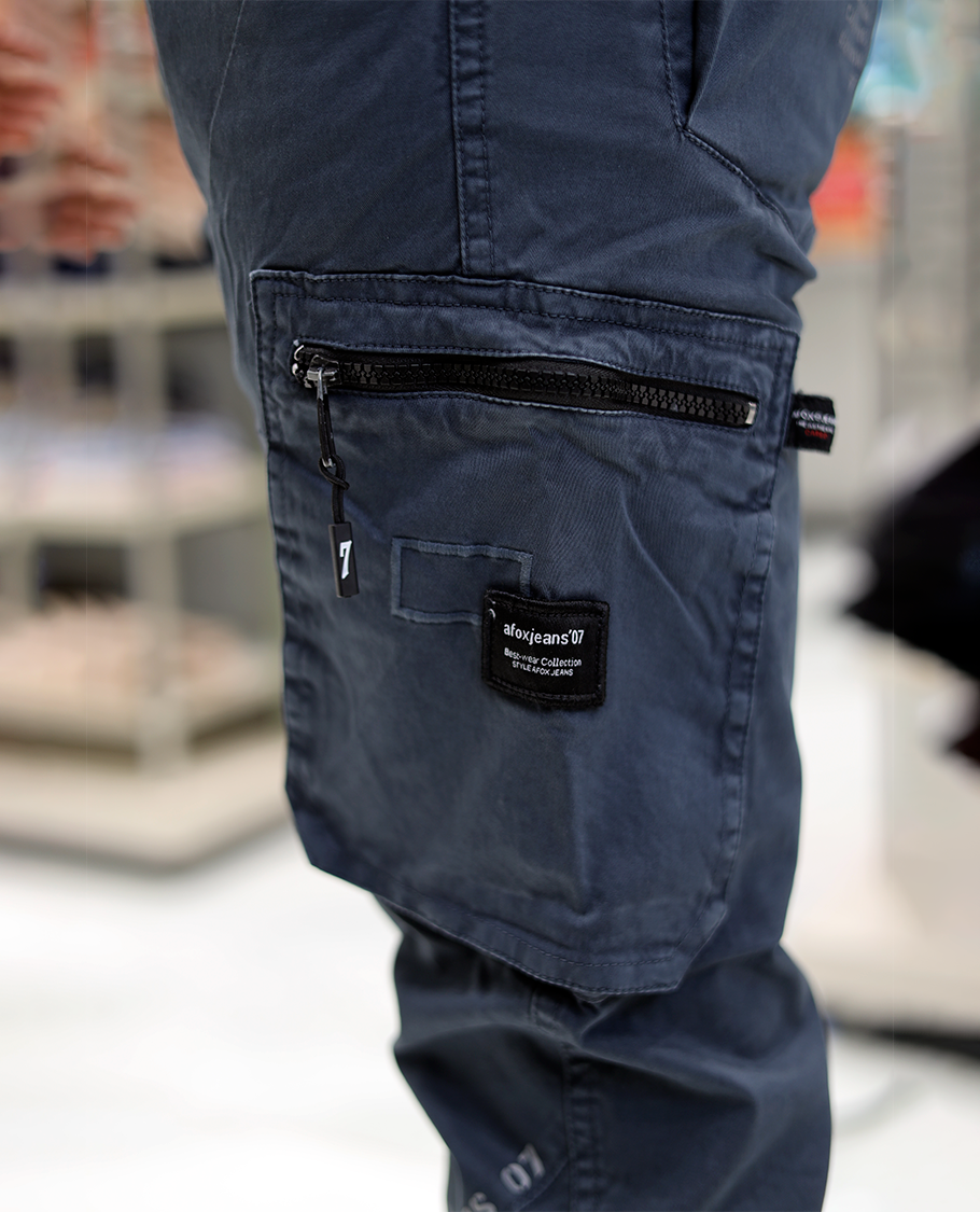 Blue Plain Cotton-Blended Cargo Trousers Come with a Regular Fit, Belt Loops, and Regular Length