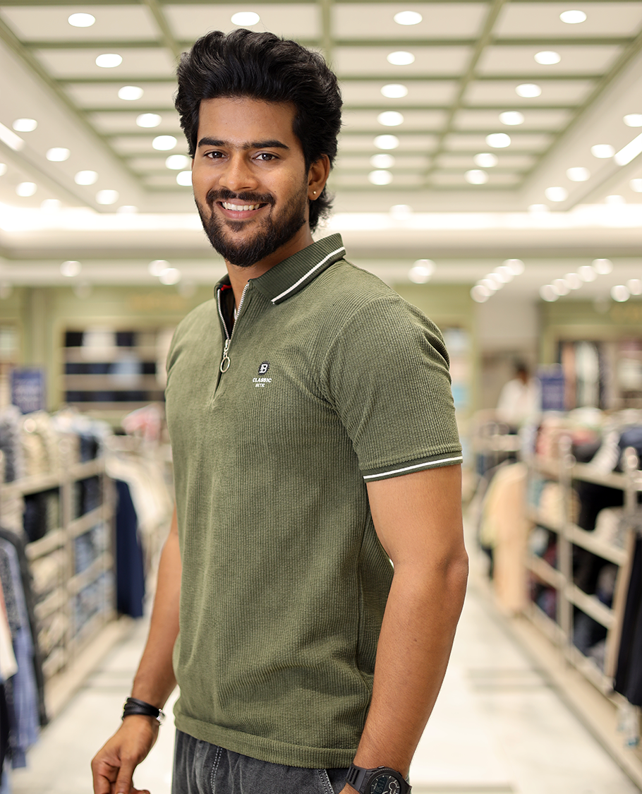 Green Corduroy T-Shirt Comes with a Polo Neck, Half-Sleeves, a Slim Fit, and Regular Length