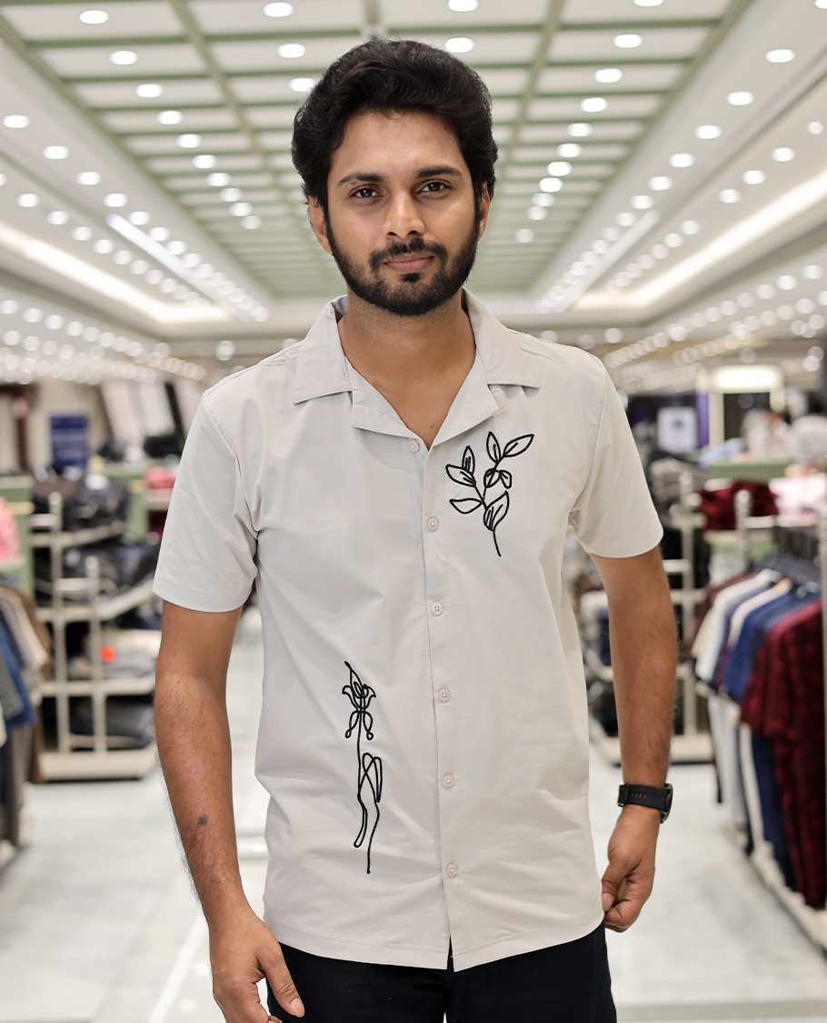 Cream Cotton-Blended Casual Shirt Comes with Leaf Motifs Outline Knitted Embroidery, Cuban Collar, Half Sleeves, Boxy Fit, and Regular Length