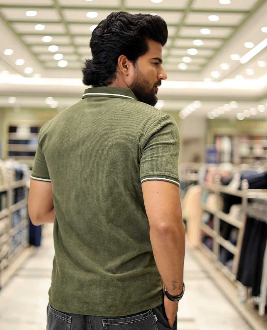 Green Corduroy T-Shirt Comes with a Polo Neck, Half-Sleeves, a Slim Fit, and Regular Length