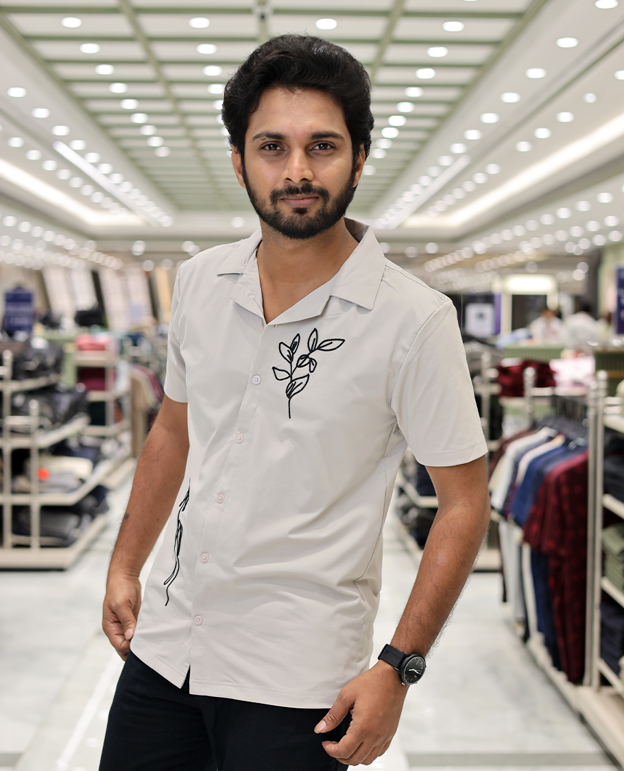 Cream Cotton-Blended Casual Shirt Comes with Leaf Motifs Outline Knitted Embroidery, Cuban Collar, Half Sleeves, Boxy Fit, and Regular Length