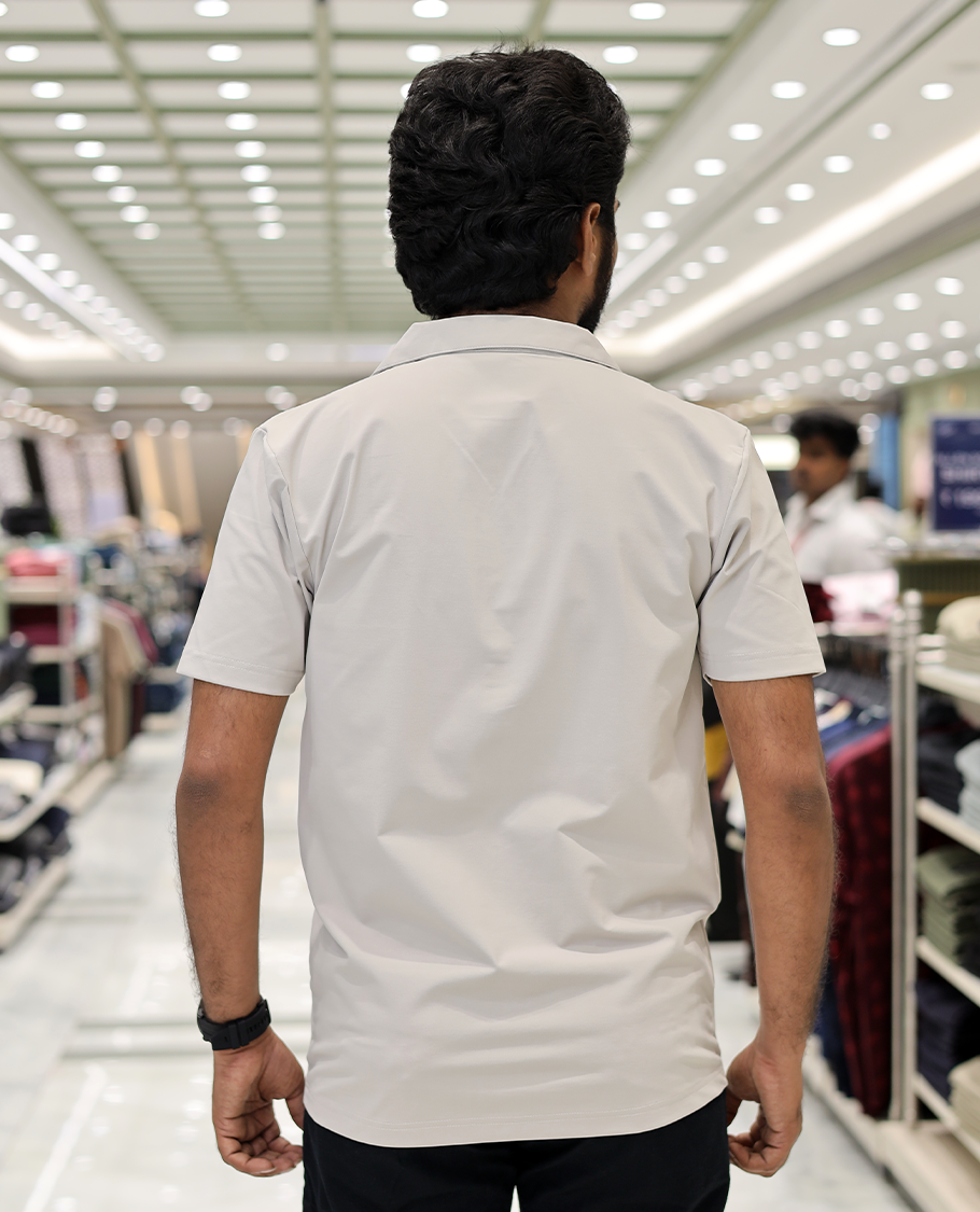 Cream Cotton-Blended Casual Shirt Comes with Leaf Motifs Outline Knitted Embroidery, Cuban Collar, Half Sleeves, Boxy Fit, and Regular Length