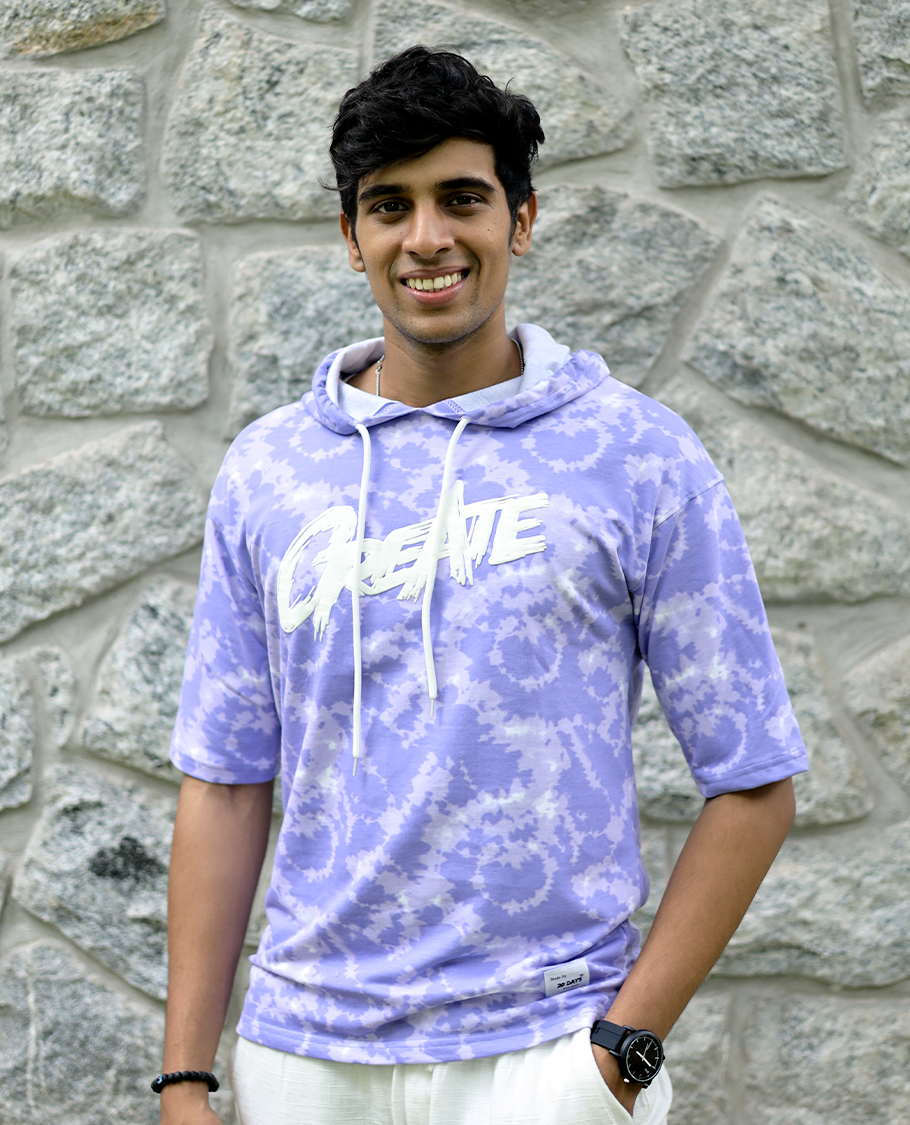 Lilac Cotton-Blended Oversized Hooded T-Shirt Features Abstract Dyed Typography Print, Half-Sleeves, and Regular Length