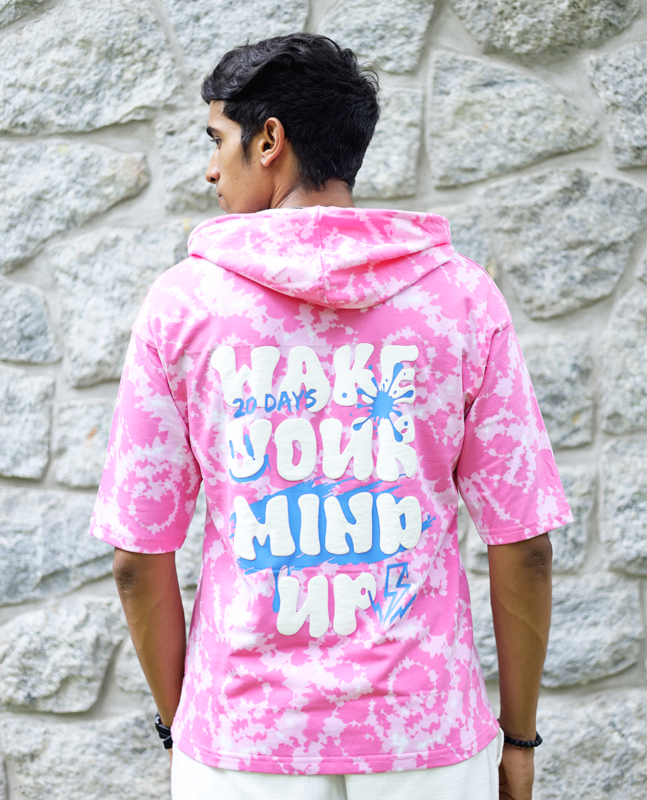 Pink Cotton-Blended Oversized Hooded T-Shirt Features Abstract Dyed Typography Print, Half-Sleeves, and Regular Length