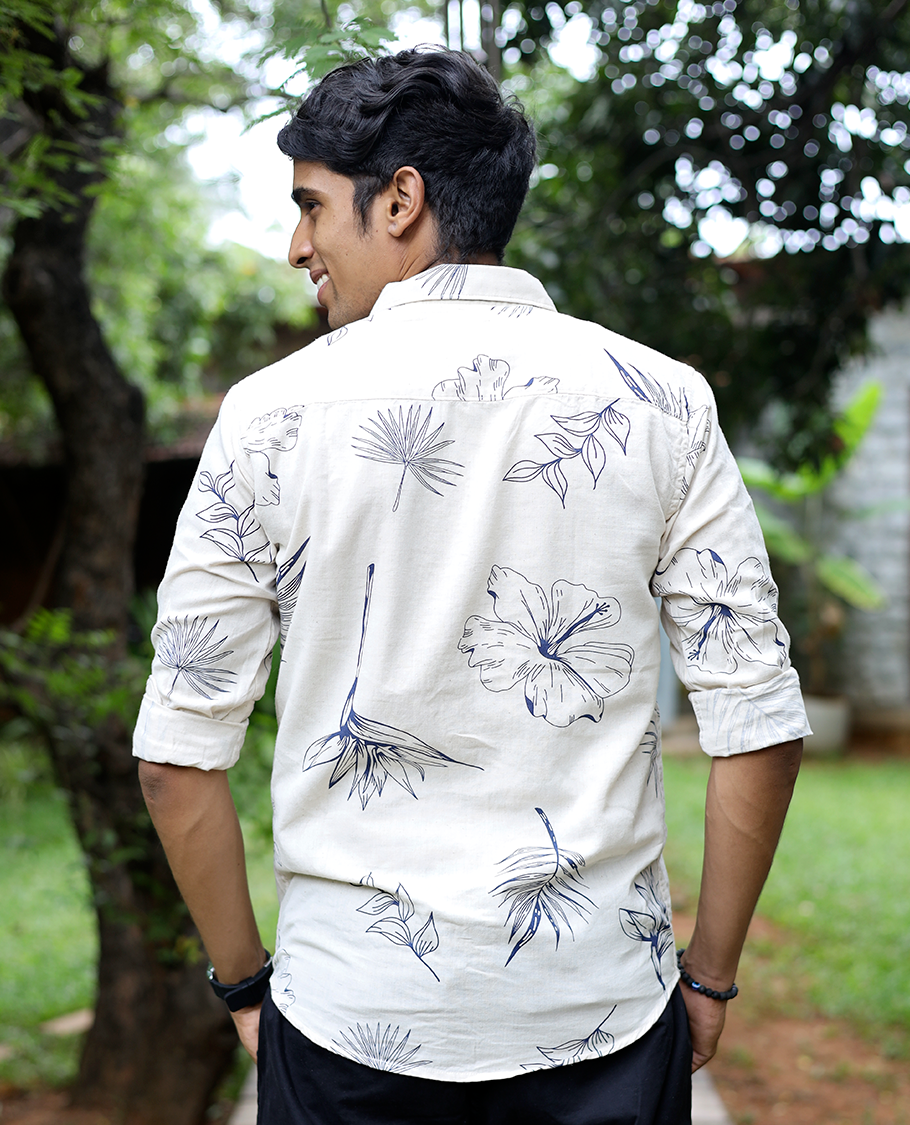 Cream Cotton-Blended Casual Shirt, Enthralled with Tropical Flora-themed Print, Full Sleeves, a Slim Fit, a Spread Collar, and a Regular Length