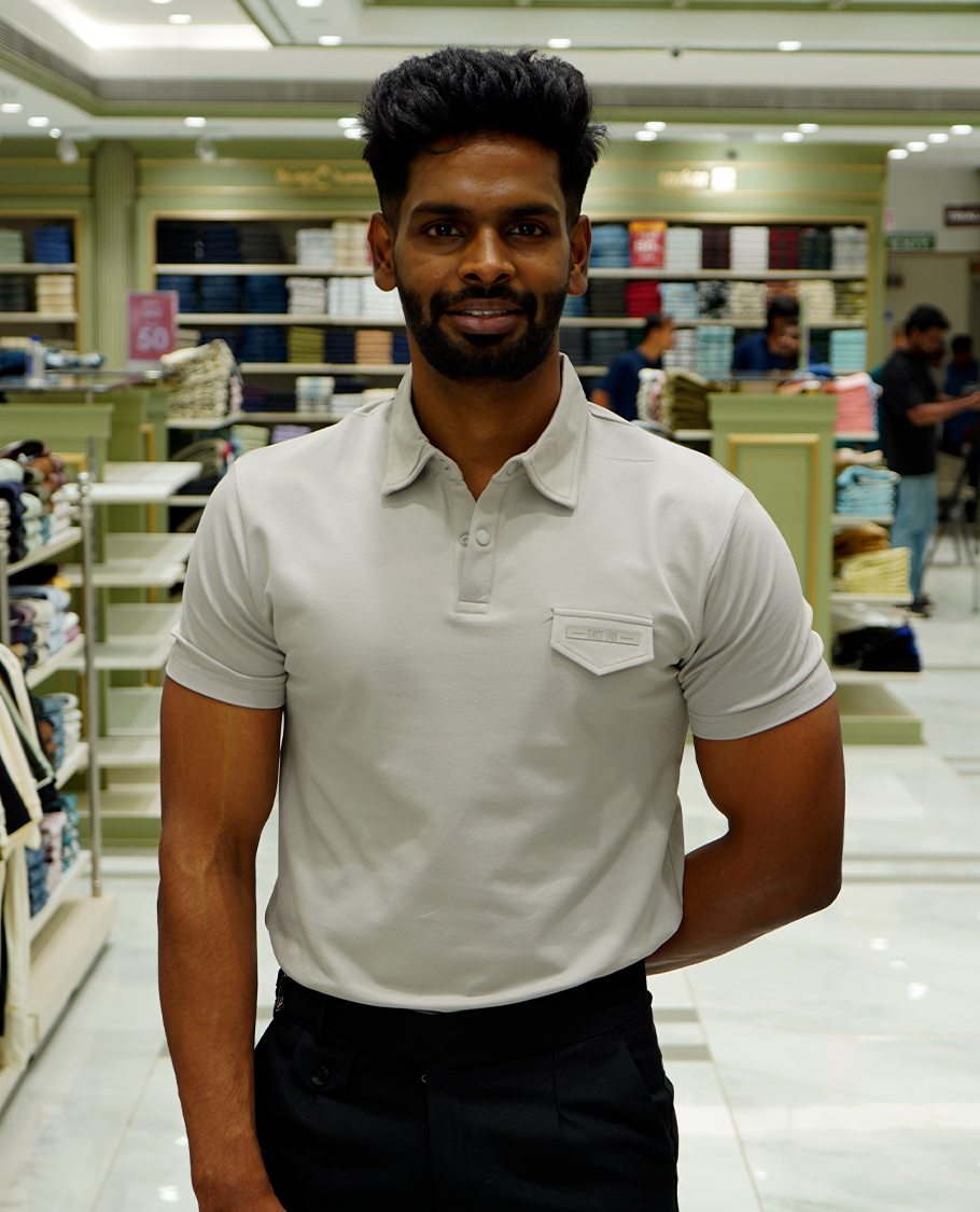 Grey Cotton-Blended Plain T-Shirt Comes with a Polo Neck, Half Sleeves, a Slim Fit, and Regular Length