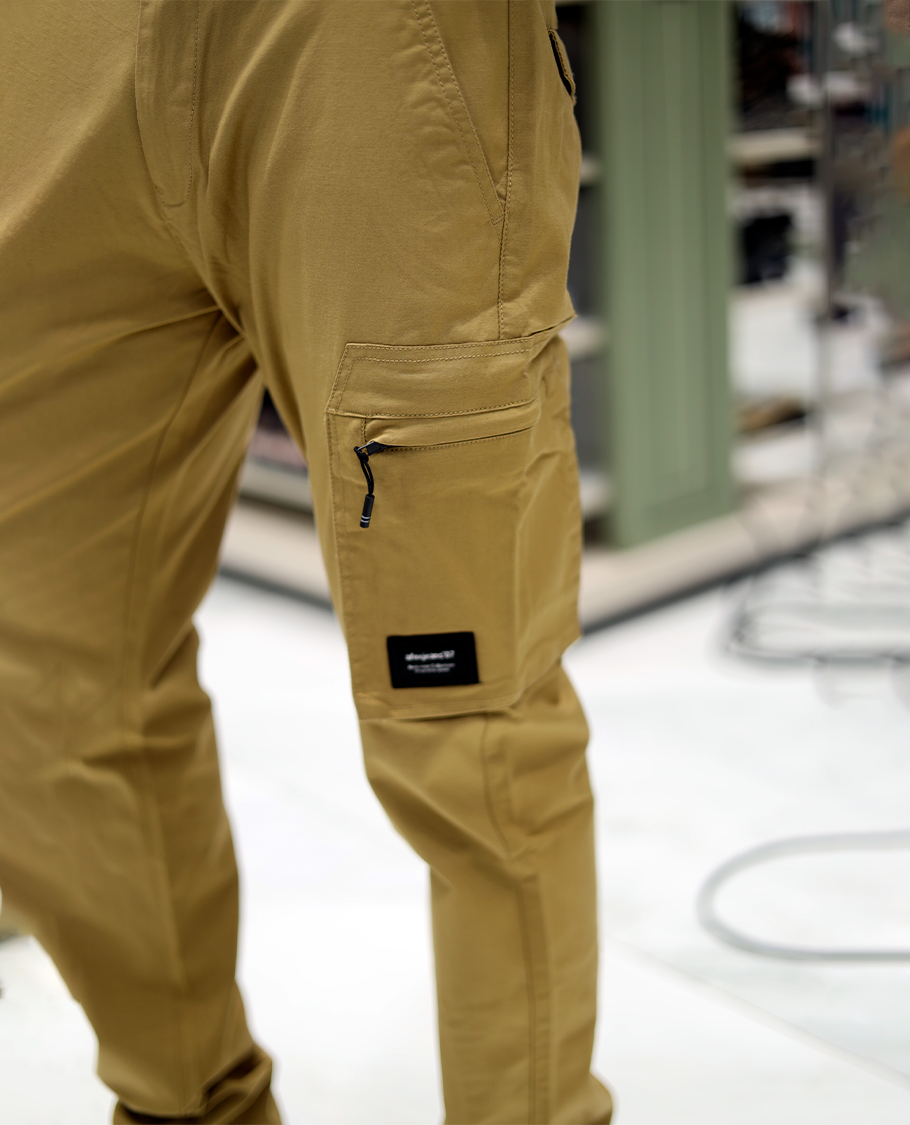 Beige Plain Cotton-Blended Cargo Trousers Come with a Regular Fit, Belt Loops, and Regular Length