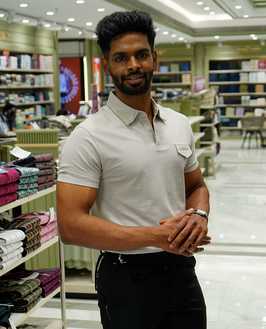 Grey Cotton-Blended Plain T-Shirt Comes with a Polo Neck, Half Sleeves, a Slim Fit, and Regular Length