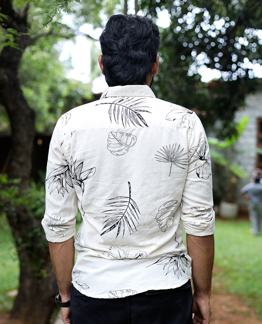Cream Cotton-Blended Casual Shirt, Elevated with Tropical Flora-themed Print, Full Sleeves, a Slim Fit, a Spread Collar, and a Regular Length