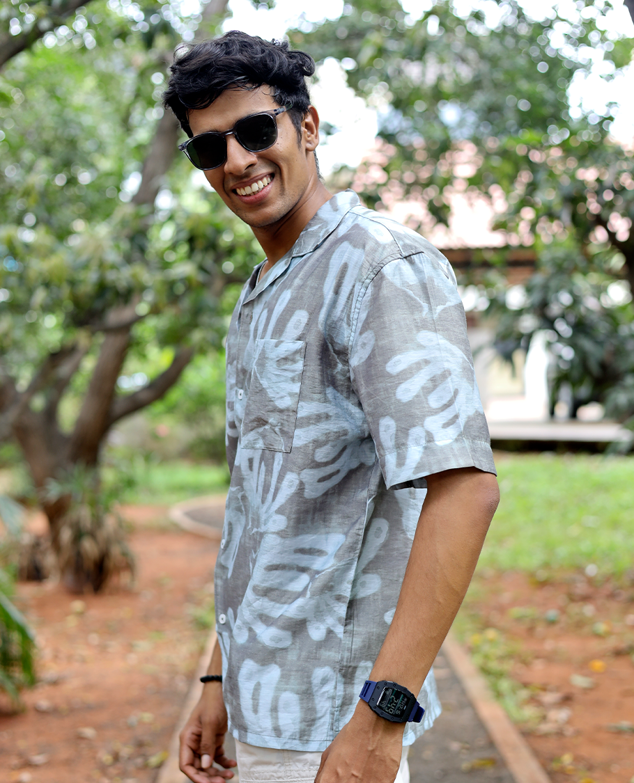Brown Cotton-Blended Casual Shirt features an Abstract Print, Half Sleeves, Cuban Collar, Regular Fit, and Regular Length