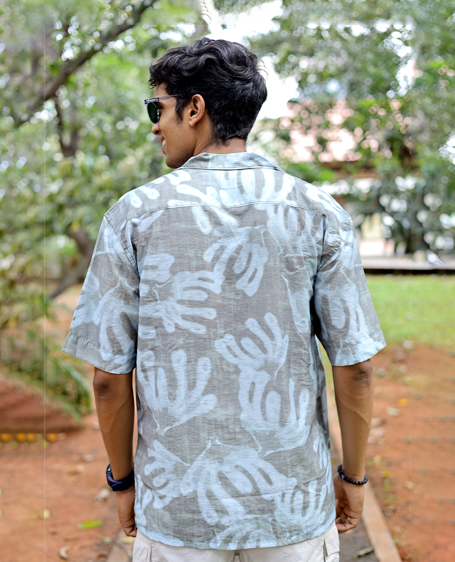 Brown Cotton-Blended Casual Shirt features an Abstract Print, Half Sleeves, Cuban Collar, Regular Fit, and Regular Length