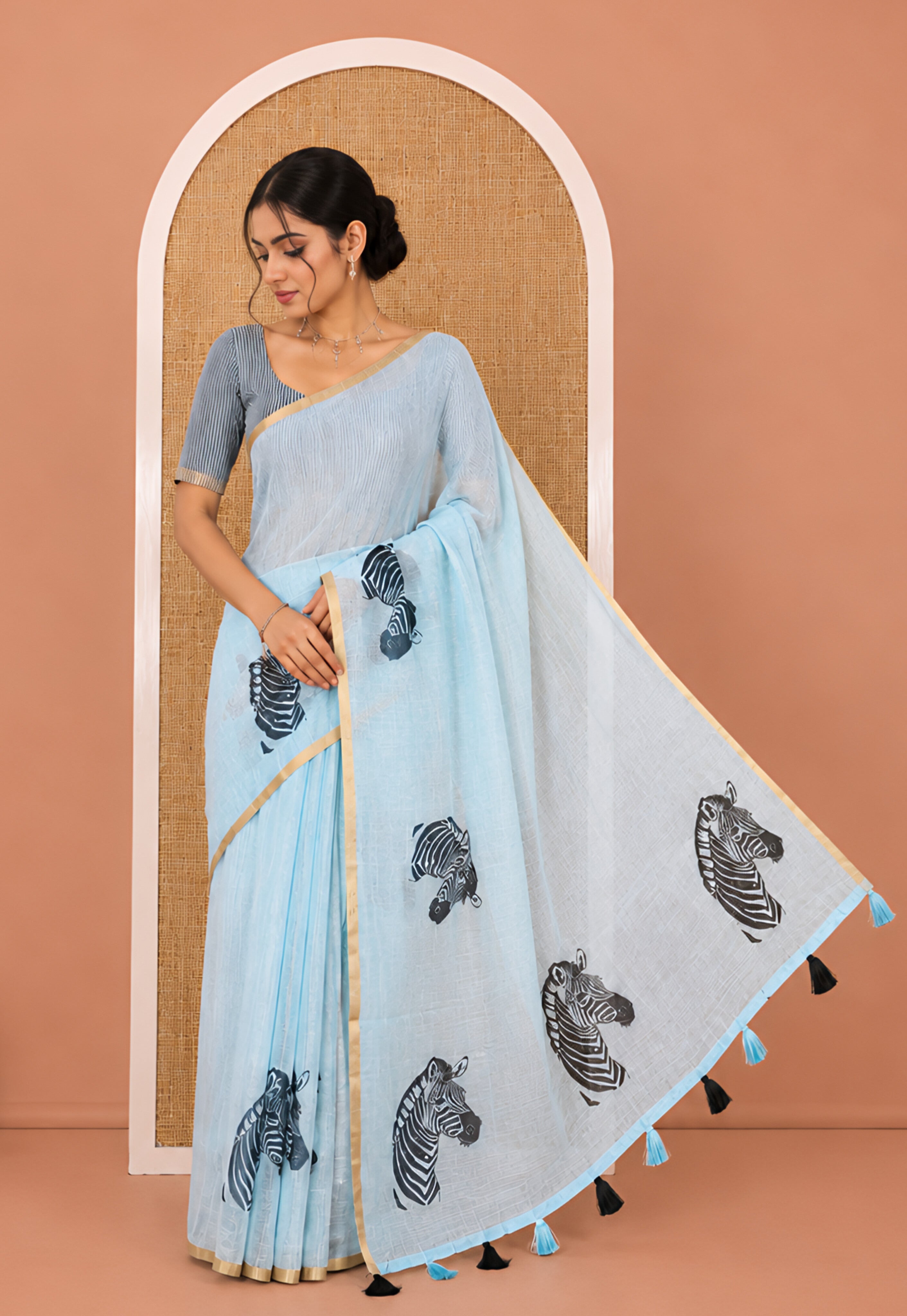 Sky Blue Linen Cotton Saree, Accentuated with Zebra Motifs Print, A Subtle Piping Border, Zebra Printed Pallu, and Comes with a Contrast Blouse