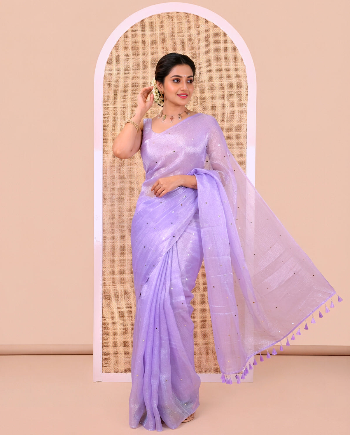 Borderless Lavender Fendy Chiffon Saree, Gleamed Up with Sequin Work on Its Body, Highlighted by a Self-Pallu of Sequin Work, and Paired with a Matching Blouse