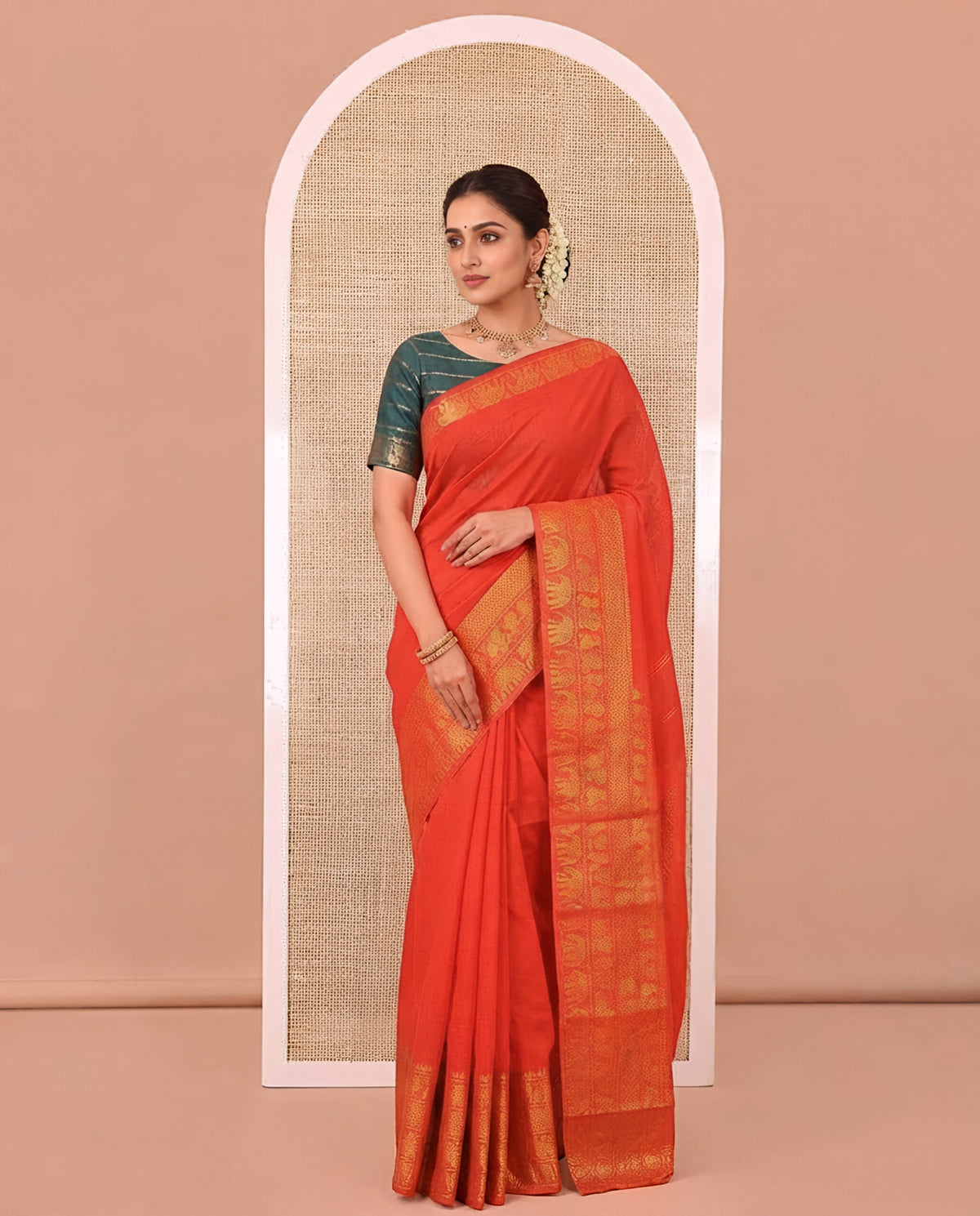 Red Plain Sungudi Cotton Saree, Highlighted by Traditional Zari Border of Peacock and Elephant Motifs Weave, Subtly Striped Pallu, and Paired with a Contrast Veldhari Design Blouse