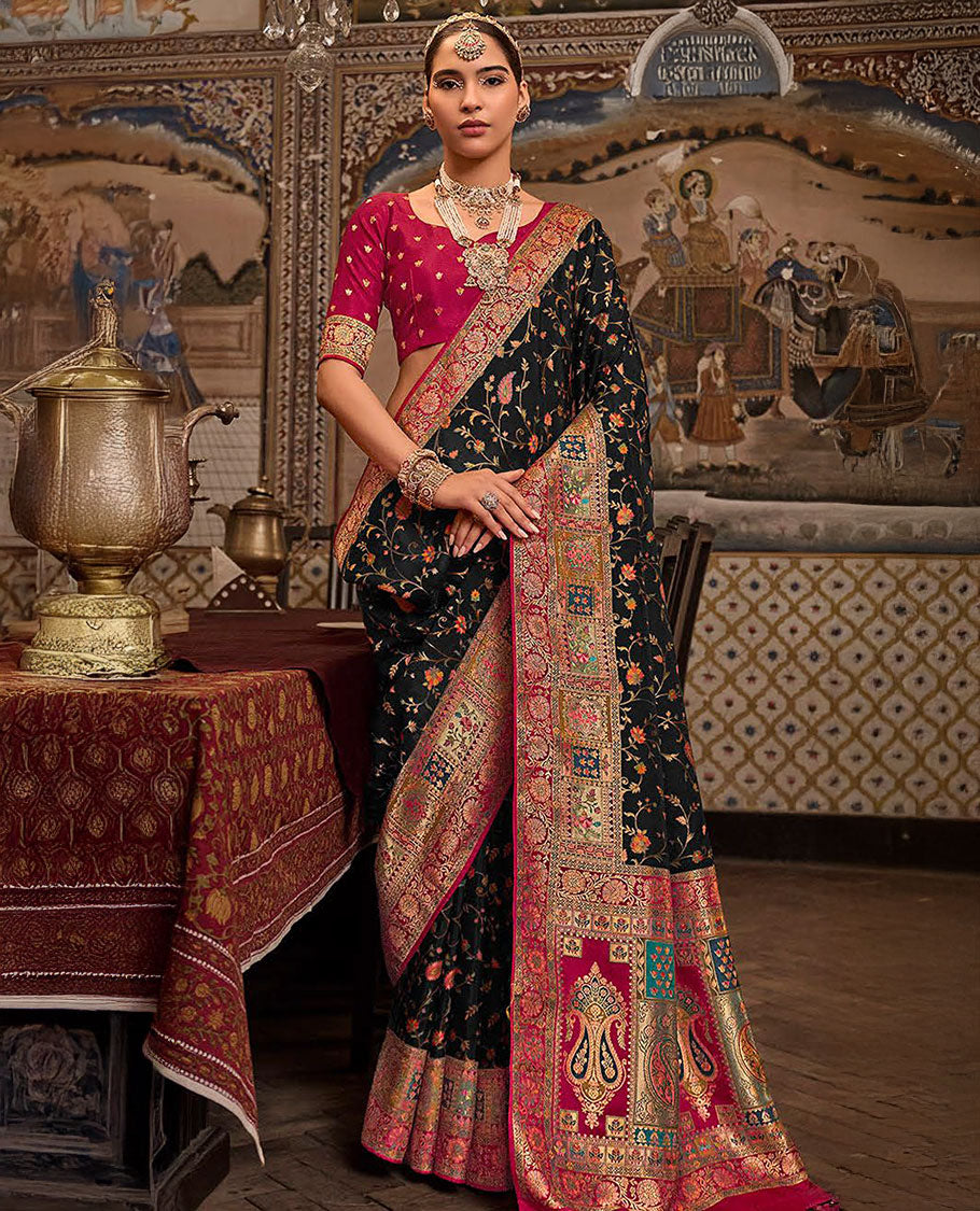 Black Designer Saree, Beautifully Bedecked with Meenakari-Style Floral-Jaal Design All Over Its Body, Complemented by a Contrast Mughal-Style Border, Meticulously Meenakari Designs Crafted Pallu, and Paired with a Contrast Blouse