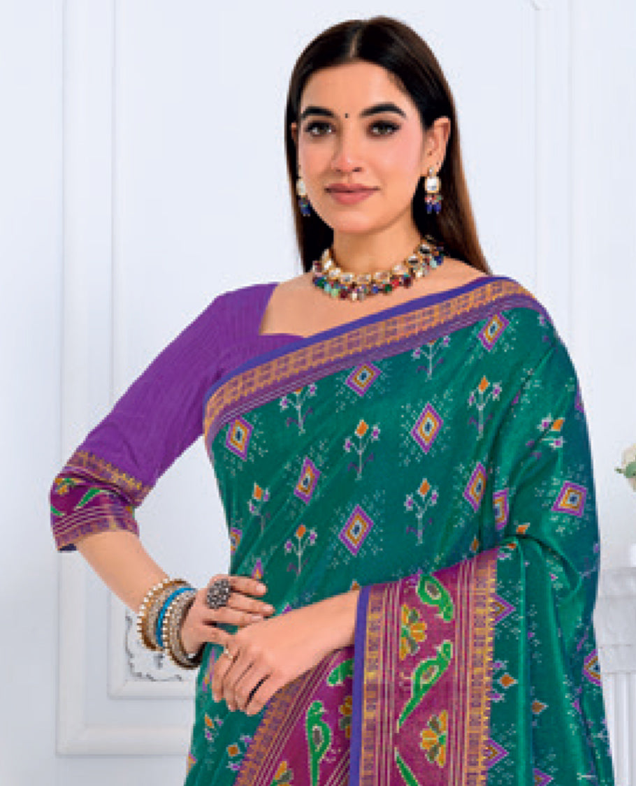 Green-Violet Fancy Raw Silk Designer Catalog Saree, Prettified with Patola-Print, a Contrast Patola Border, Pallu of Patola Parrot Design, and a Contrast Blouse