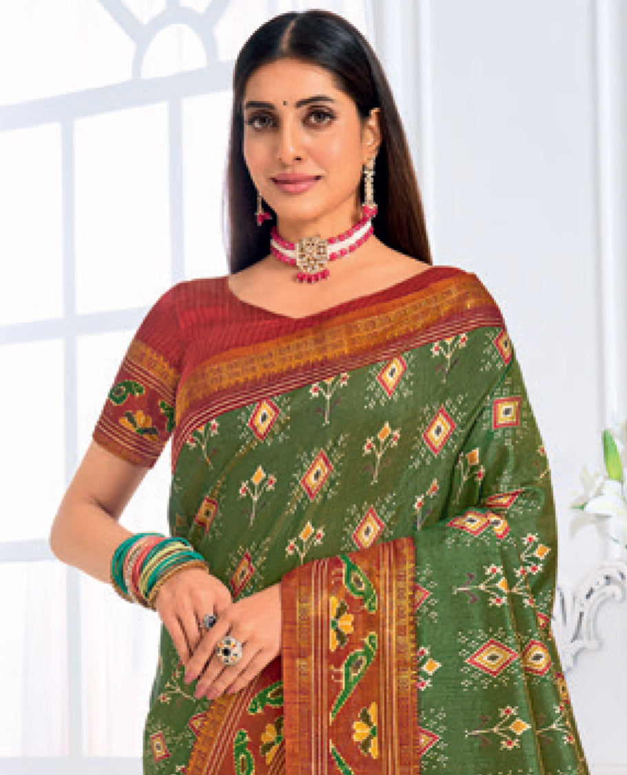 Green Fancy Raw Silk Designer Catalog Saree, Prettified with Patola-Print, a Contrast Patola Border, Pallu of Patola Parrot Design, and a Contrast Blouse