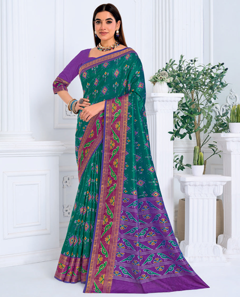 Green-Violet Fancy Raw Silk Designer Catalog Saree, Prettified with Patola-Print, a Contrast Patola Border, Pallu of Patola Parrot Design, and a Contrast Blouse