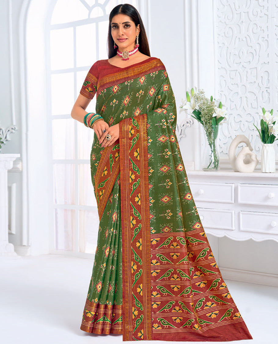Green Fancy Raw Silk Designer Catalog Saree, Prettified with Patola-Print, a Contrast Patola Border, Pallu of Patola Parrot Design, and a Contrast Blouse