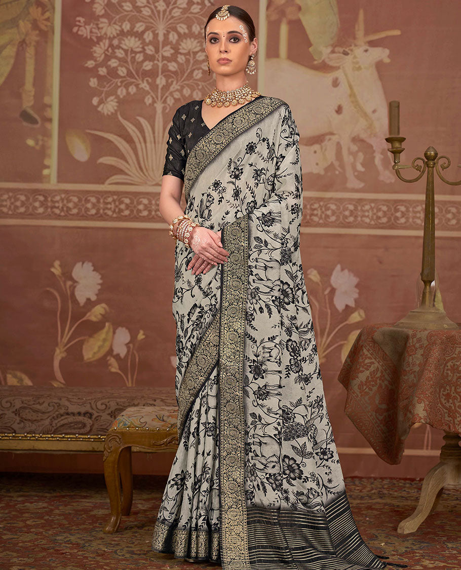 Beige floral and sparrow printed designer saree, contrast floral creeper zari border, and zari striped pallu
