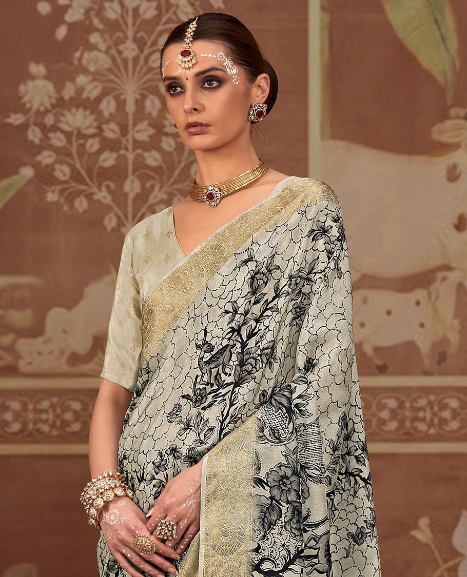 Beige flora-fauna printed designer saree, zari border, and zari striped pallu
