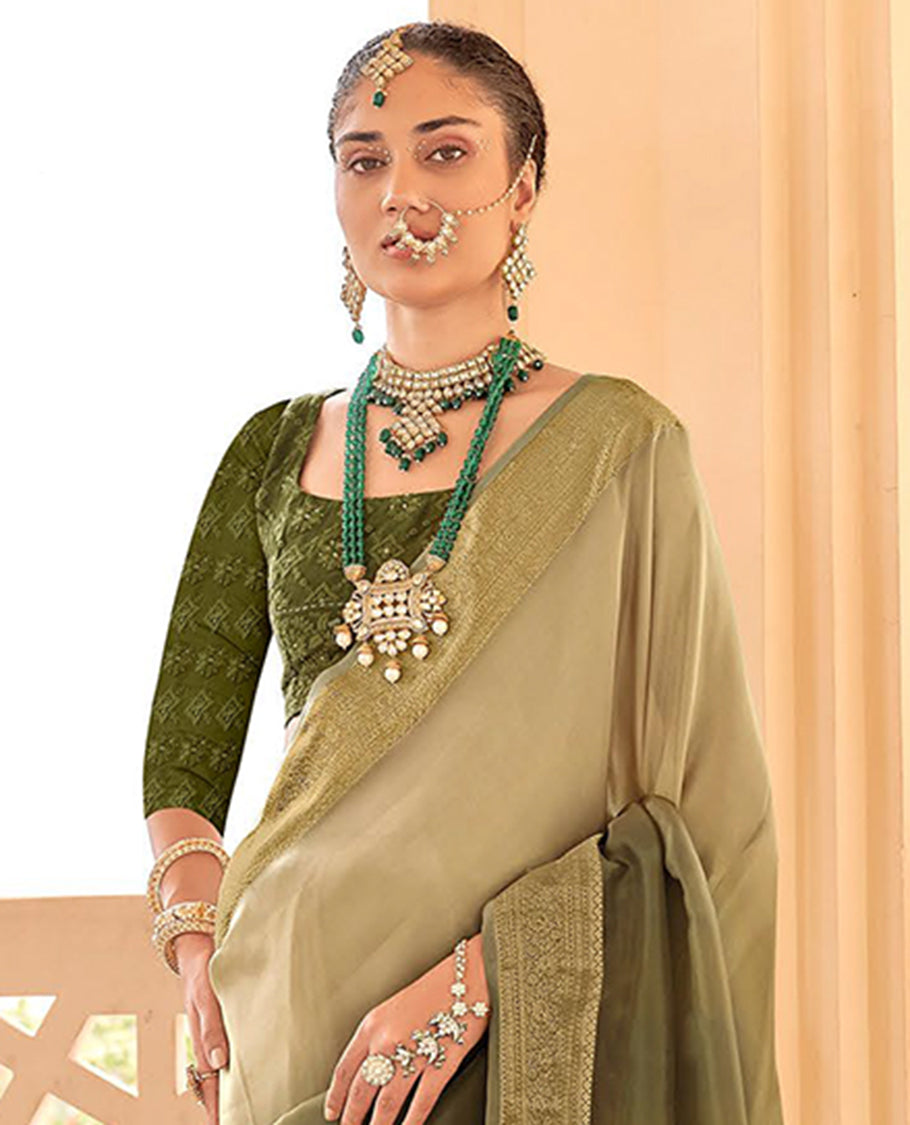 Green catalouge designer saree with self zari design border & striped pallu