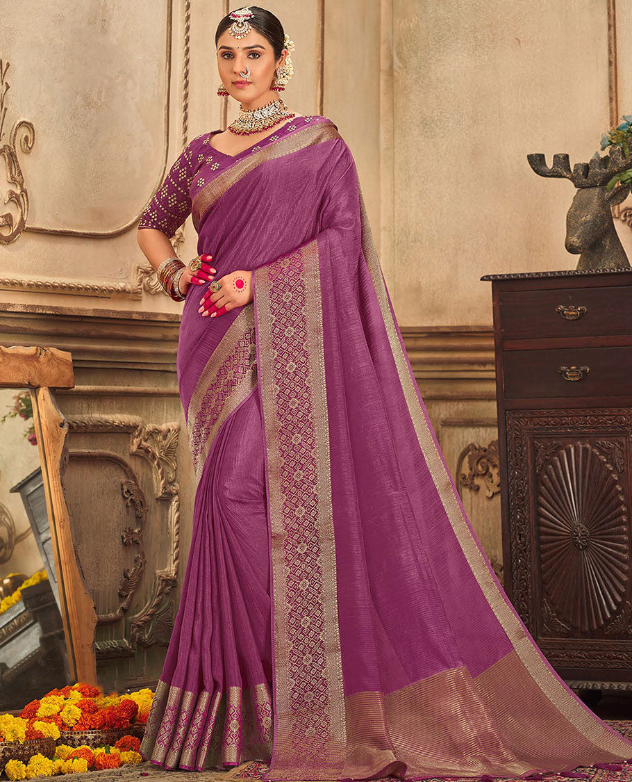 Purple plain designer saree, patola-style motifs woven border, and zari striped pallu