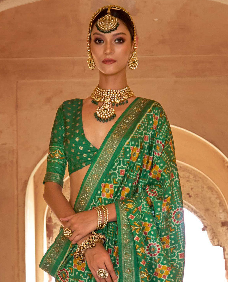 Green double-ikkat patola printed designer catalog saree, stone work border, and patola patterned pallu