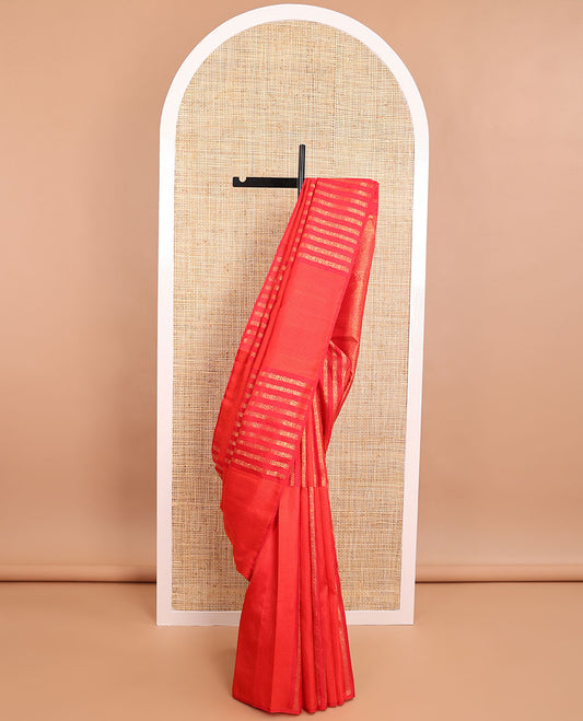 Borderless red geometric design kancheepuram silk saree with intricate floral zari design pallu