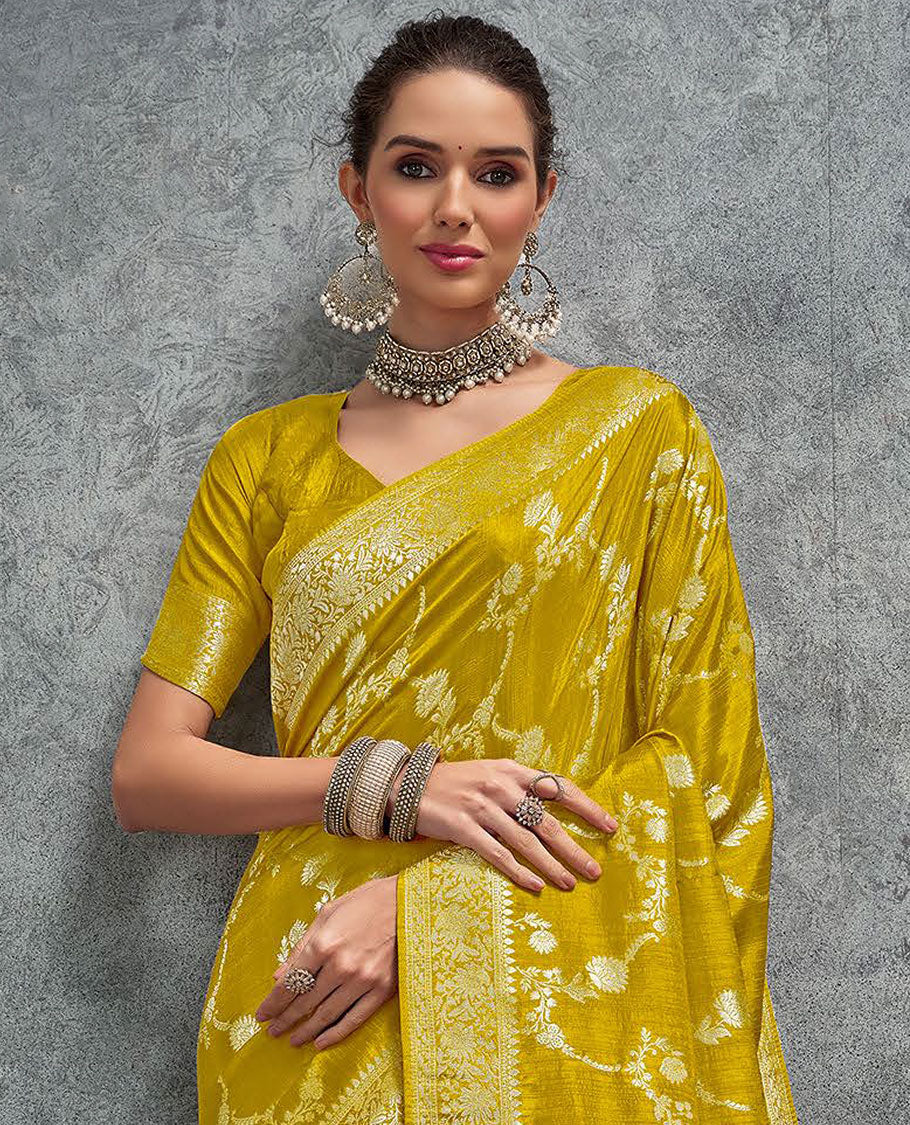 Yellow floral jaal jacquard designer saree, floral creeper design border, and intricately woven pallu