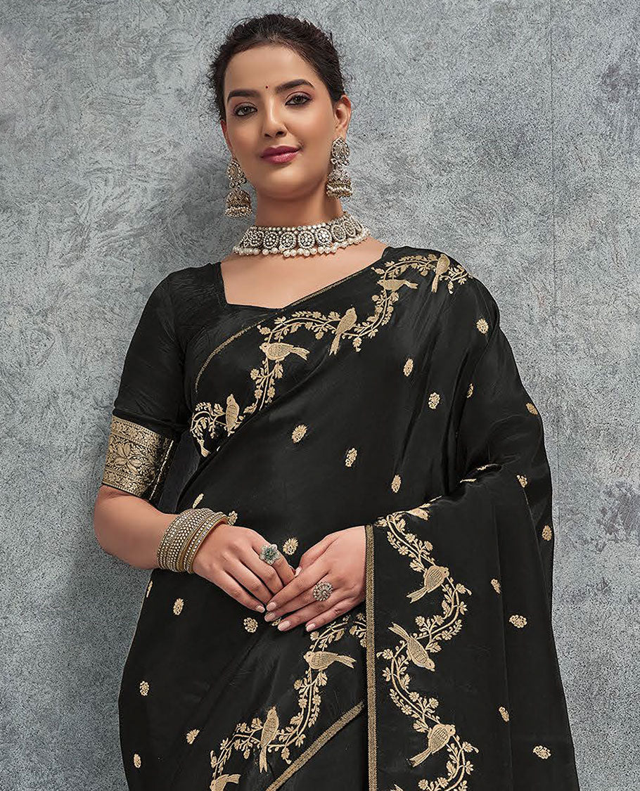 Black buttas designer saree, floral creeper and bird border, and intricate pallu