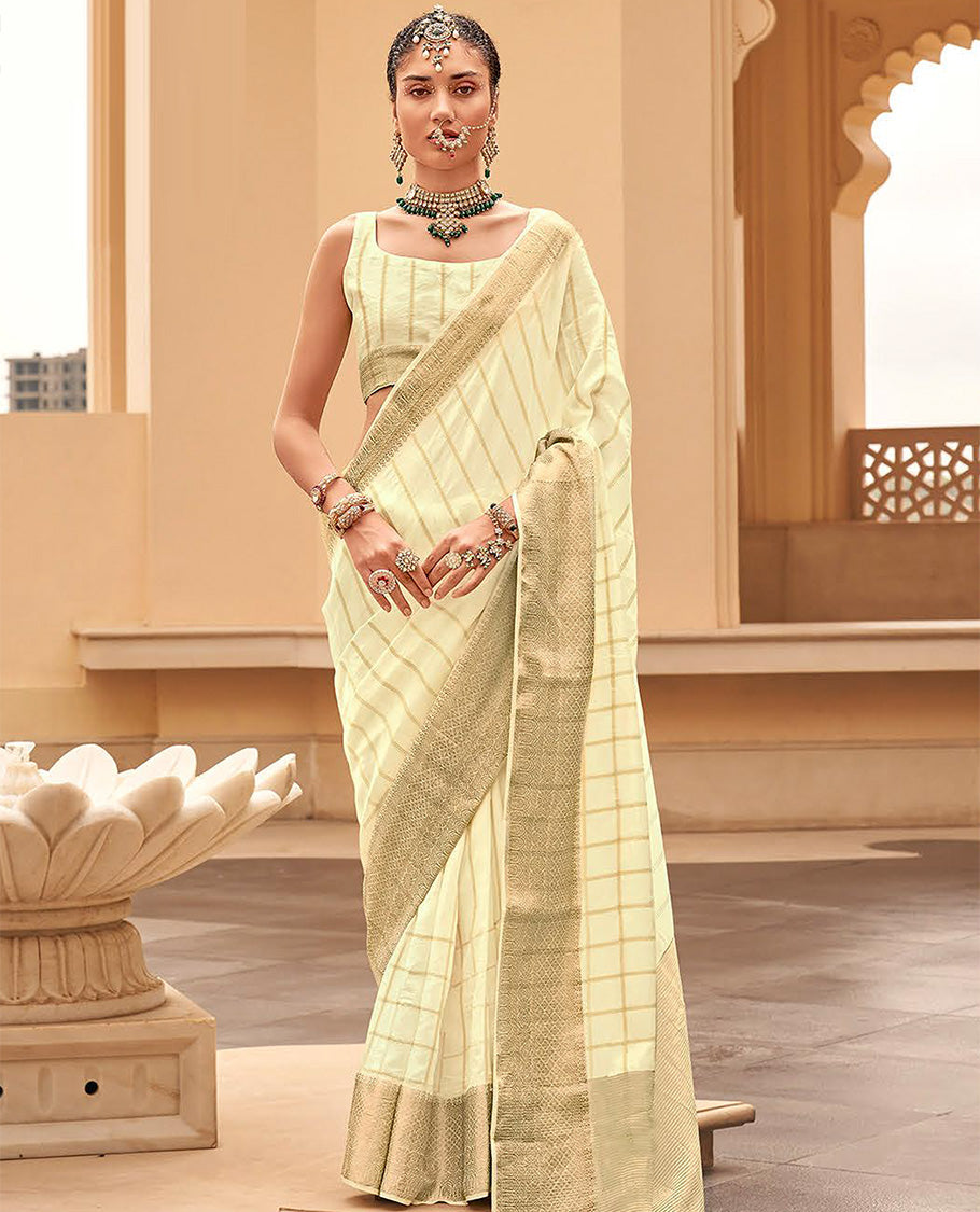 Cream striped catalouge designer saree with self zari design border & checked pallu