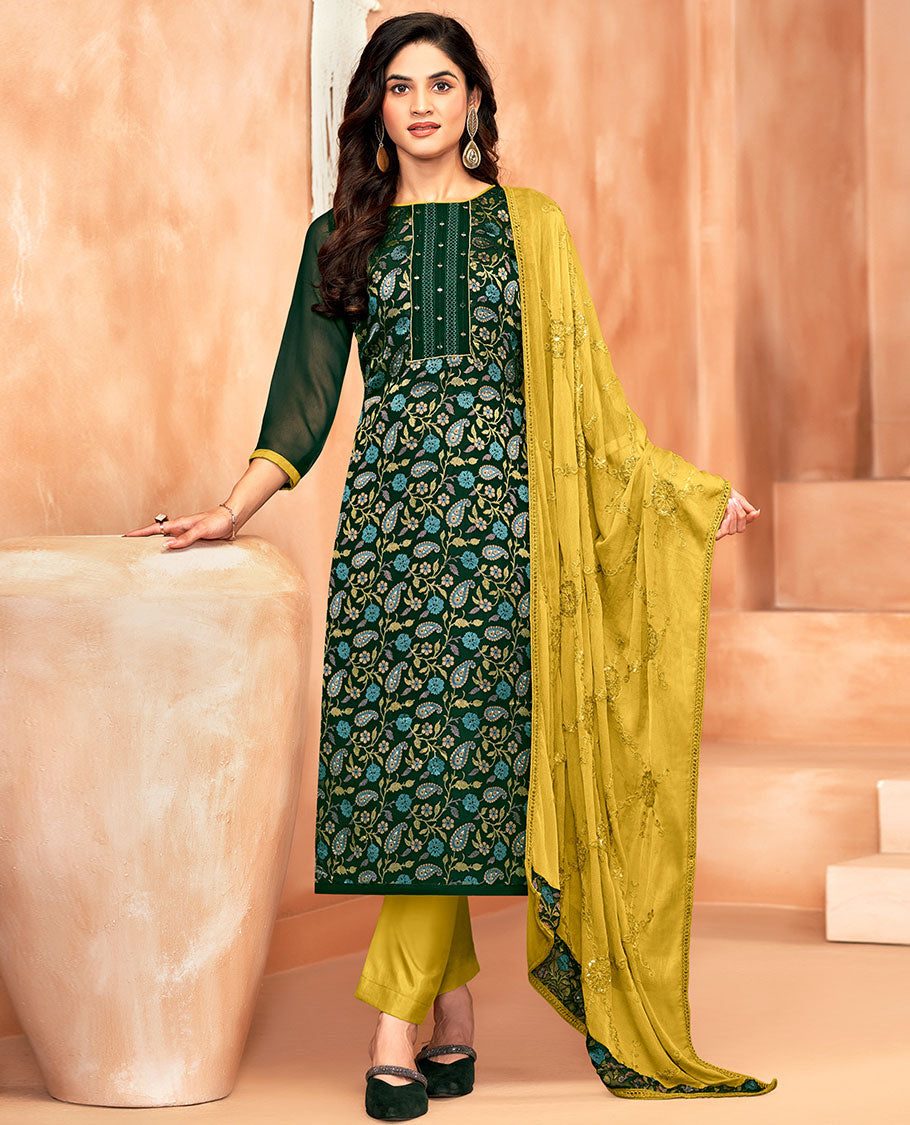 Green material chudidar set, paisley vine print and neck work top, contrast plain bottom, and jaal embroidered dupatta