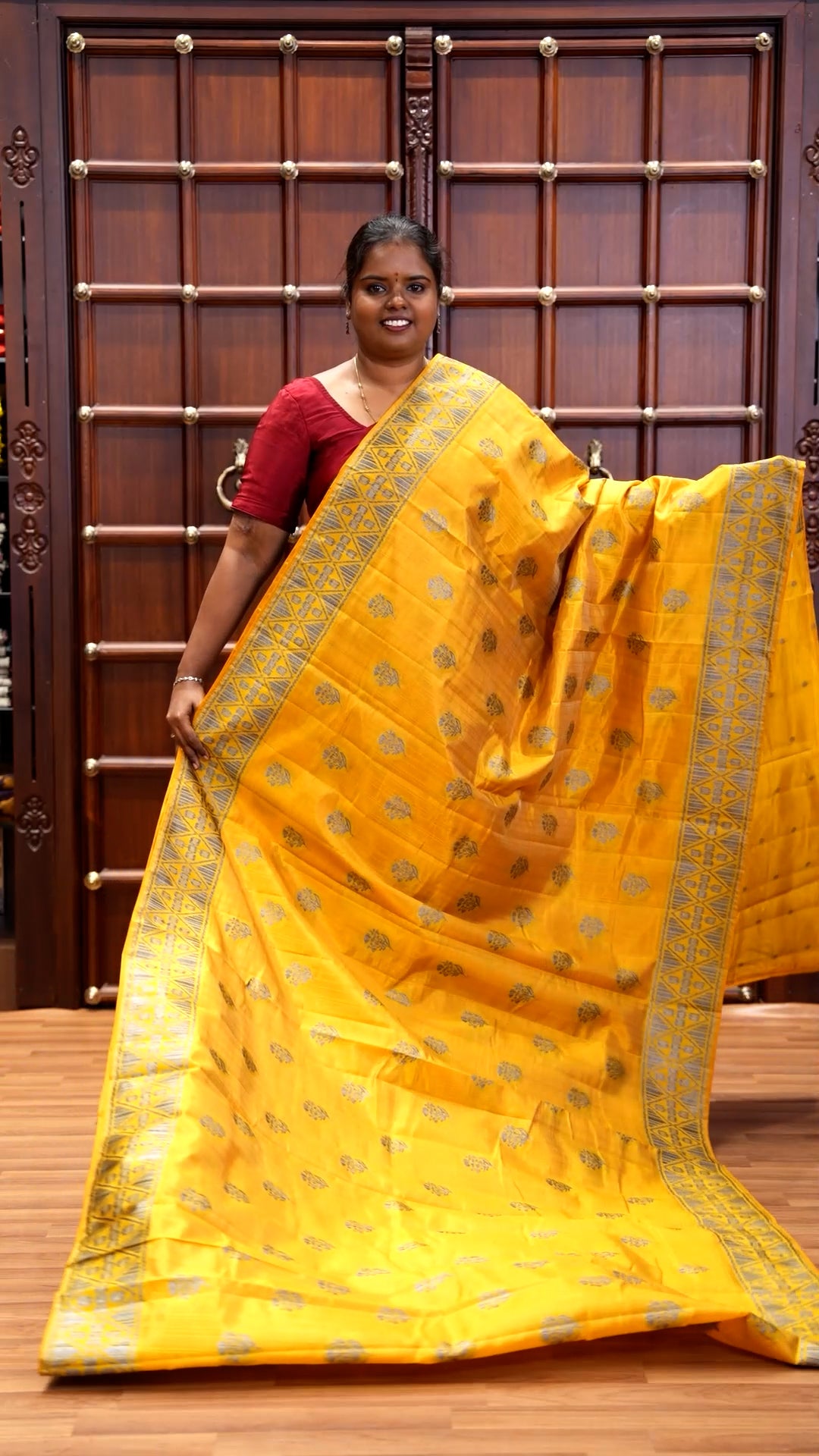 Mustard Semi-Tussar Saree Subtly Woven With Floral Zari Buttas, Featuring a Geometric-Patterned Zari Border, Adorned With a Butta-Enclosed Checked Pallu, and a Matching Blouse
