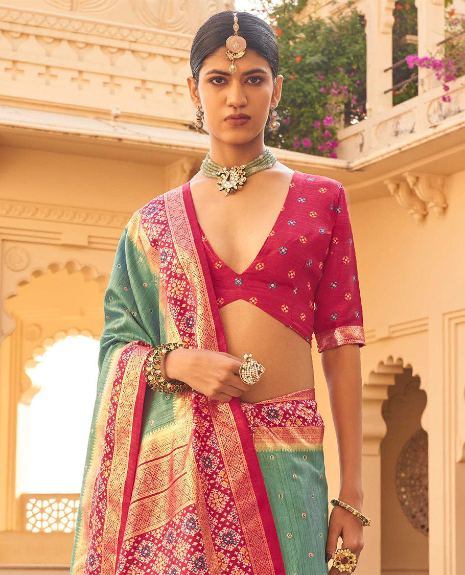 Rama Ikat Patola Designer Saree, Subtly Woven with Ikat Buttas, Complemented by a Contrast Ikat Border, Intricate Pallu, and a Contrast Blouse