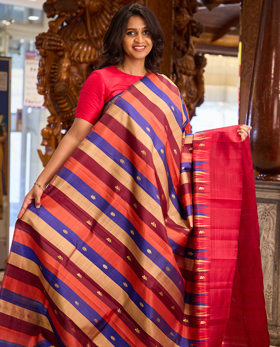 Multi-color striped with zari buttas Kanchipuram silk saree, contrast one-sided thazampoo rekku border, and zari design pallu